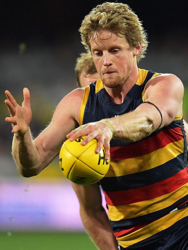 He might not be able to get a touch, but Rory Sloane makes things easier for his teammates when he cops a hard tag. Picture: Getty Images