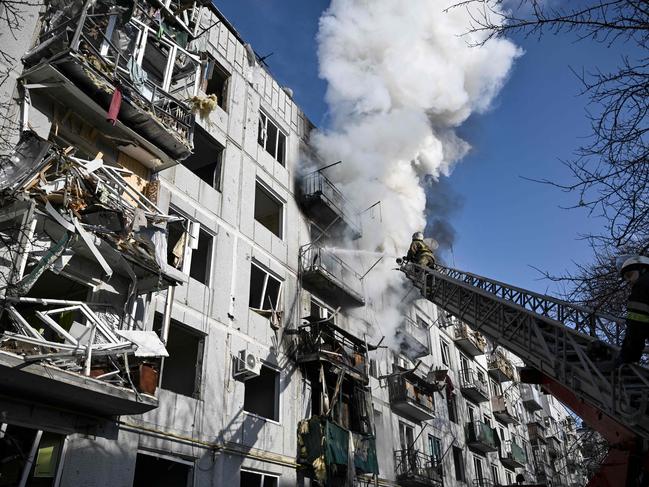 Firefighters tackle a fire after bombings in the eastern Ukraine town of Chuguiv. Picture: AFP