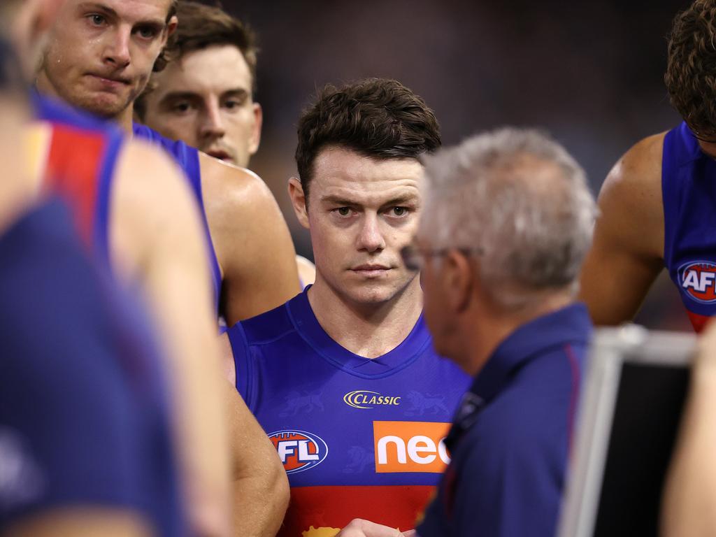 Lachie Neale listens to Lions coach Chris Fagan. Picture: Michael Klein