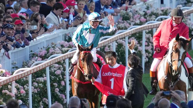 Romantic Warrior and James McDonald return to the roars of The Valley crowd. Picture: Scott Barbour–Racing Photos via Getty Images