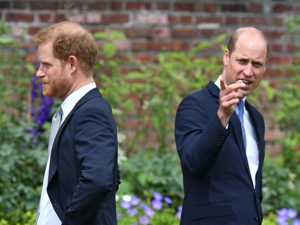 Prince Harry, Duke of Sussex and Prince William, Duke of Cambridge during the unveiling of a statue they commissioned of their mother Diana, Princess of Wales, in the Sunken Garden at Kensington Palace.