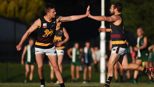 There were high fives all around as Doncaster East rallied from seven goals behind on Saturday. Picture: James Ross.