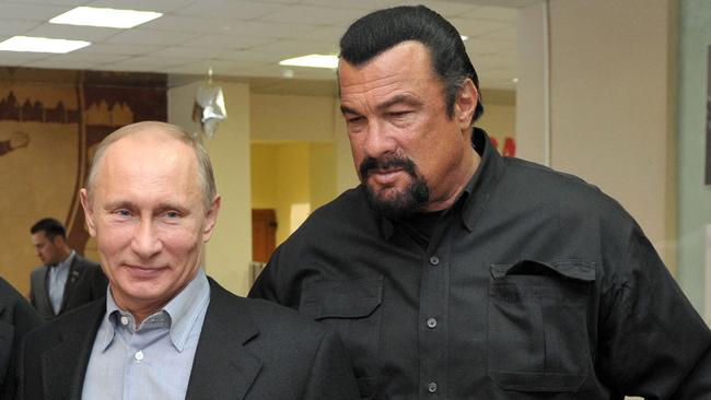 Russophile Steven Seagal with Vladimir Putin. Picture: AFP