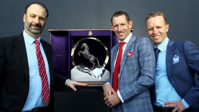 Racing NSW CEO Peter V'landys with jockeys Hugh Bowman and Kerrin McEvoy and the fabulous Everest trophy. Picture: Hollie Adams/The Australian