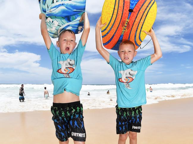 WEATHER: Out cooling off at Kawana Beach are Bruno and Leon Bobkowski, 7, from Poland. Photo Patrick Woods / Sunshine Coast Daily.