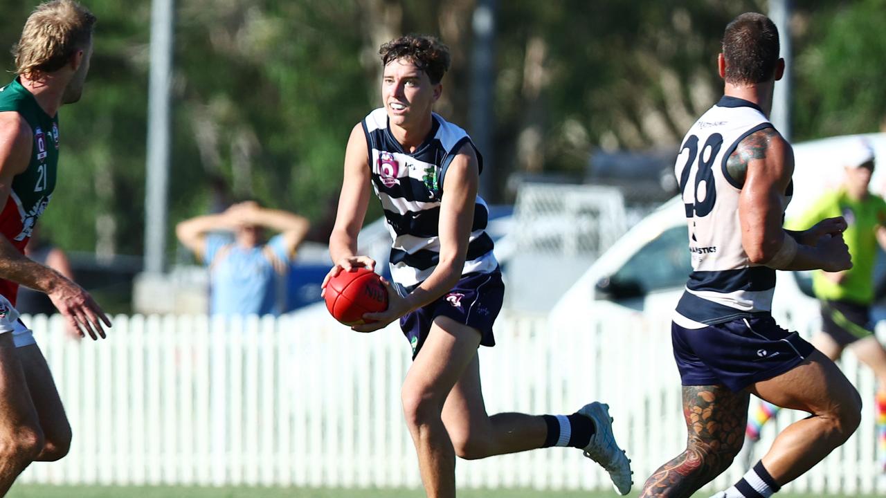 Zayne Moore, 16, gets a kick away in the AFL Cairns Pride Round clash between the Port Douglas Crocs and the South Cairns Cutters at Port Douglas. Picture: Brendan Radke