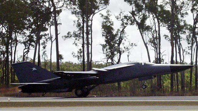 Cape York, August 6, 2005. A RAAF F-111 strike bomber takes to the skies from RAAF Base Scherger. (AAP Image/Max Blenkin) NO ARCHIVING