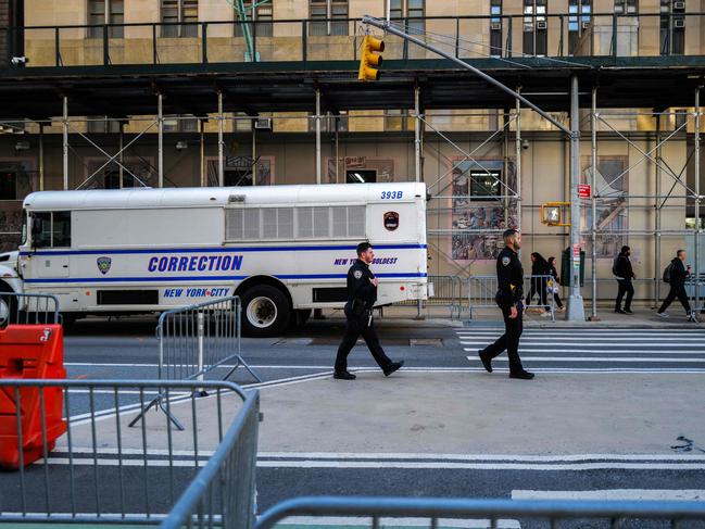 A police truck parks outside the courthouse, blocking photographers attempting to capture Trump’s arrival. Picture: Charly Triballeau/AFP