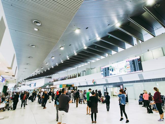 The accused allegedly assaulted two strangers inside a terminal at Perth Airport on Thursday morning.