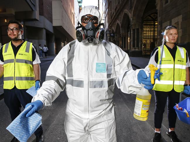 Smart Corporate Solutions Group offering its services - at no cost - to beef-up cleaning in the city.  SCS Group cleaners, Salvatore, Sandy and Jess in their cleaning PPE gear and cleaning equipment ready to clean the CBD.                     Picture: David Caird