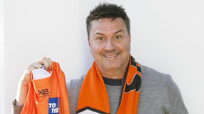 FoTony Squires is massive Swans fan but he was persuaded to don Giants colours ahead of Saturday’s AFL Grand Final. Picture: Tim Pascoe