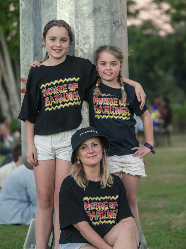 BARUNGA, AUSTRALIA - NewsWire Photos - JUNE 08, 2024:Jade Thomas and her daughters Calin and Henley watch The Arnhem Crows V The Lajamanu Swans in the Big Rivers League as the annual Barunga Festival, 375 km south of Darwin as the community of Barunga opens its doors to the world in a celebration of Culture, Sport and Art Picture: NewsWire / Glenn Campbell