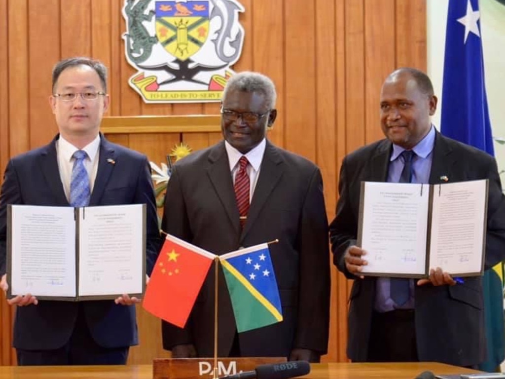 China's first ambassador to the Solomon Islands Li Ming (Left) and the Prime Minister of the Solomon Islands Manasseh Sogavare (Middle). Source: Supplied.