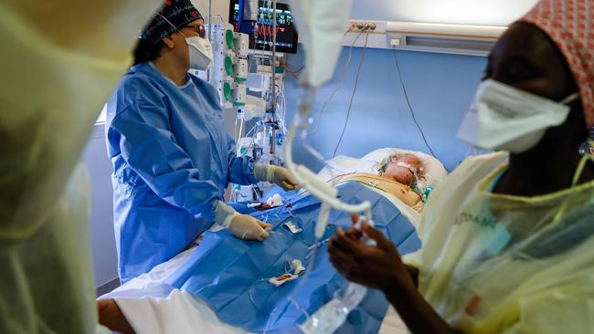 A coronavirus patient is treated in an intensive care room of The Estree Private Hospital at Stains on the outskirts of Paris. Picture: AFP