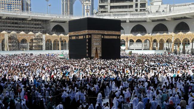 Muslim pilgrims walk around the Kaaba (Tawaf al-Wadaa), Islam's holiest shrine, at the Grand Mosque in Saudi Arabia's holy city of Mecca.