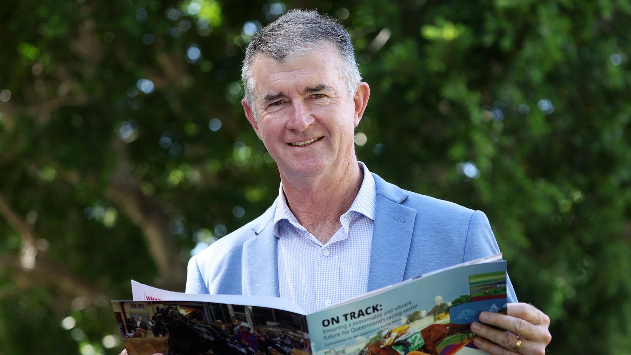 Minister for Racing Tim Mander reads through a discussion paper outlining consultation details with the racing review. Picture: Liam Kidston