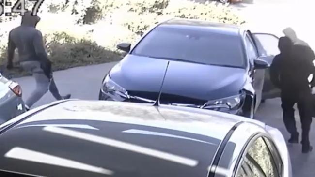 CCTV shows four men running from a Wallan property after an aggravated burglary. Picture: Victoria Police.