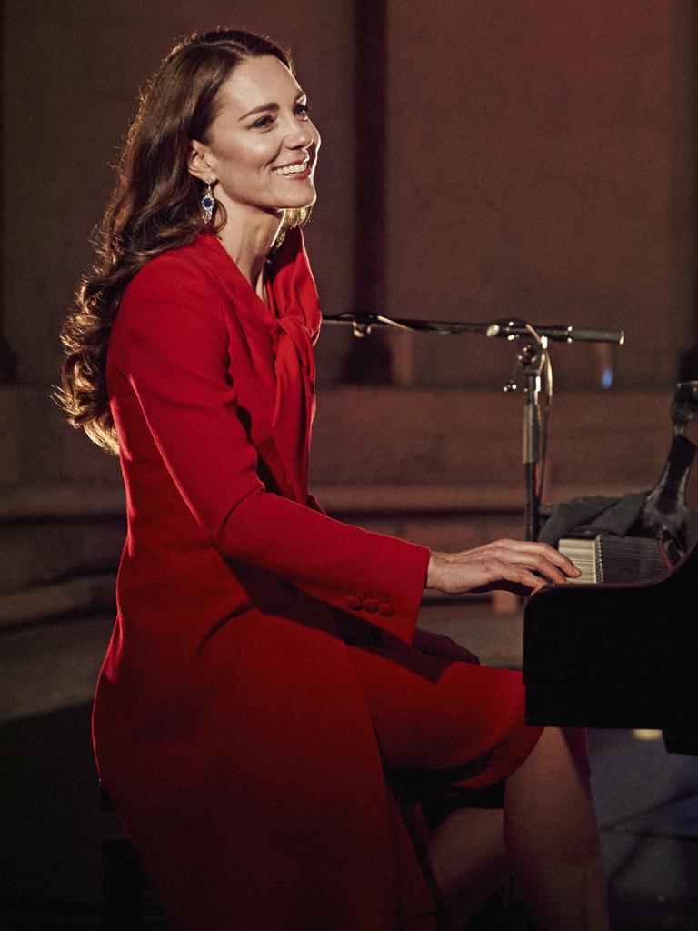 Kate playing the piano during a televised Christmas carol concert on December 8, 2021. Picture: Alex Bramall/Kensington Palace via Getty Images.