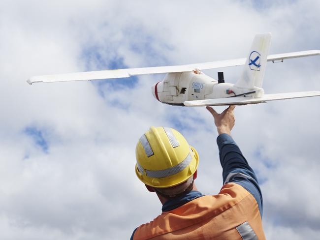 A squadron of drones at the BHP Billiton-managed Goonyella coal mine near Moranbah in central Queensland is leading a radical change in the way in which miners keep physical tabs on their operations, traditionally  the preserve of the mining surveyorsÕ profession. The first of the UAVÕs arrived at the BHP Mitsubishi Alliance-owned (BMA) Goonyella a little more than a year ago.  Weighing 2.5kgs and looking more like a hobbyistÕs model airplane than the more ubiquitous  hovering helicopter type of drone, the German built drones Ð or more correctly unmanned aerial vehicles (UAVs) -  have a flight time of up to 40 minutes, fly at up to 80kms an hour at a height of 120 metres, and can cover 80 hectares of the mining lease in a single flight.