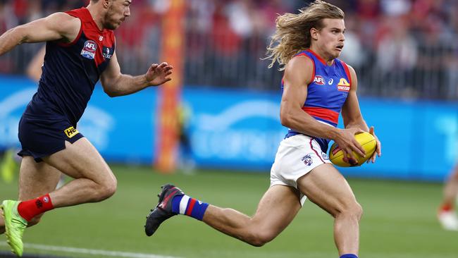 Bulldog Bailey Smith charges down the wing during the AFL grand final against Melbourne. Photo: Michael Klein