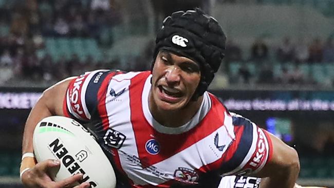 SYDNEY, AUSTRALIA - MAY 22: Joseph Suaalii of the Roosters is tackled during the round 11 NRL match between the Sydney Roosters and the Brisbane Broncos at Sydney Cricket Ground, on May 22, 2021, in Sydney, Australia. (Photo by Matt King/Getty Images)