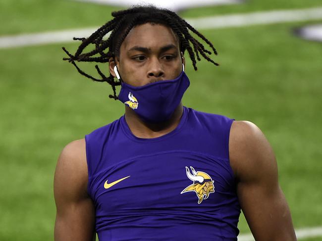 MINNEAPOLIS, MINNESOTA - NOVEMBER 29: Justin Jefferson #18 of the Minnesota Vikings warms up before the game against the Carolina Panthers at U.S. Bank Stadium on November 29, 2020 in Minneapolis, Minnesota. (Photo by Stephen Maturen/Getty Images)