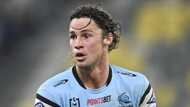 TOWNSVILLE, AUSTRALIA - AUGUST 17: Nicho Hynes of the Sharks runs the ball during the round 25 NRL match between North Queensland Cowboys and Cronulla Sharks at Qld Country Bank Stadium on August 17, 2023 in Townsville, Australia. (Photo by Ian Hitchcock/Getty Images)