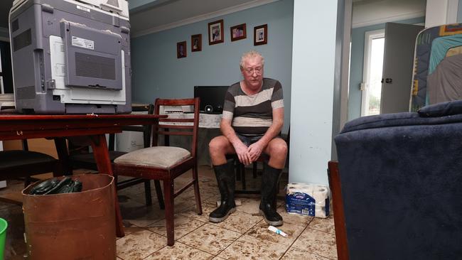 A monsoonal tropical low pressure system has brought devastating widespread flooding to North Queensland and parts of Cardwell in Far North Queensland, with over 1000 millimetres of rain recorded in some areas. Cardwell resident Ian Rowe has lived in his Roma Street house for 36 years, and has never seen flood waters rise so high as they did on Sunday night. Picture: Brendan Radke