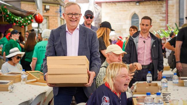 Anthony Albanese delivers lunches at the Bill Crews Foundation Christmas Lunch in Ashfield in Sydney’s inner west. Picture: Thomas Parrish