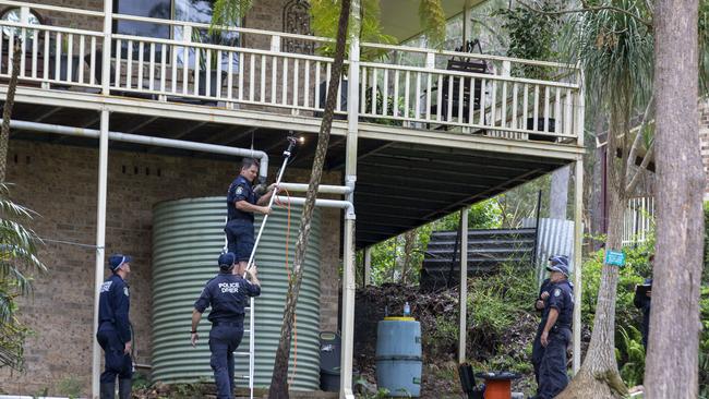 Police divers at William Tyrrell‘s late foster grandmother’s home in November last year. Picture: Liam Mendes / The Australian