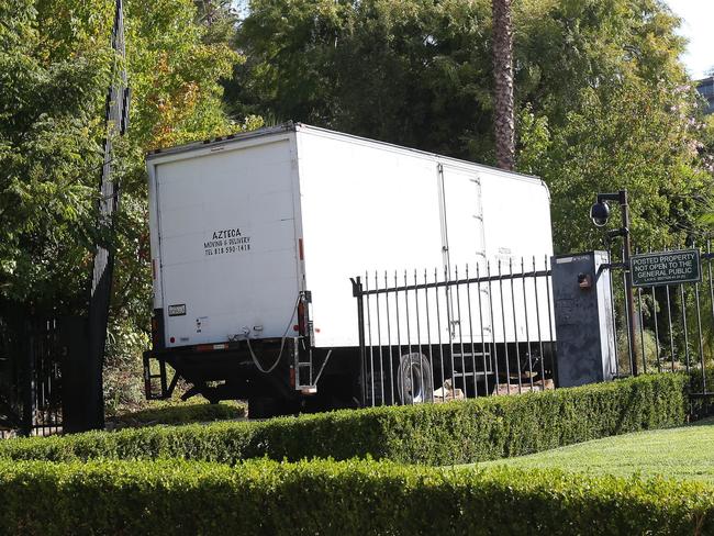 Moving vans are pictured at Angelina Jolie and Brad Pitt’s Hollywood compound. Picture: Mark Kreusch/Splash News