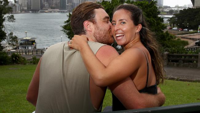 Couple Ed Cameron and Stefania Schiller enjoy the view from Kirribilli before the area will be closed to the public on NYE. Picture: Toby Zerna