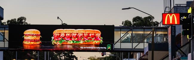 Subway has placed a series of billboards up around the country taking a cheeky swipe at some of the most widely recognised burgers in the world. Picture: Supplied