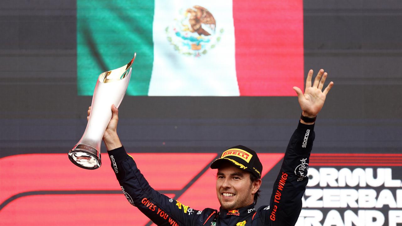 Sergio Perez celebrates the win. Picture: Alex Pantling/Getty Images