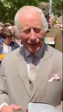 His Royal Highness King Charles accepts a limited edition Kangaroo Jerky while meeting people on Sunday.