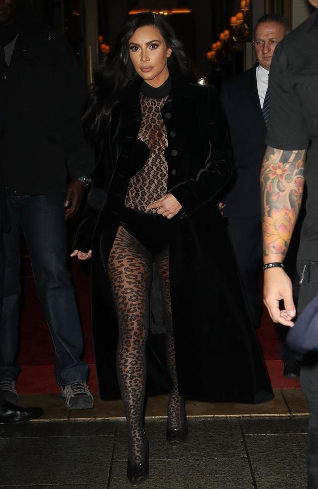 Kim Kardashian models bedazzled bra, sheer catsuit on a boat
