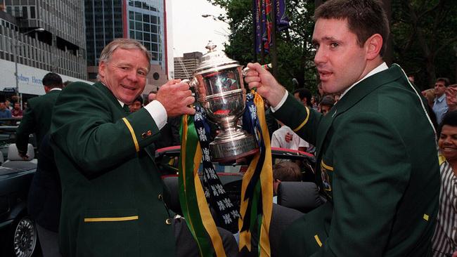 Bob Fulton with the world cup and Brad Fittler.