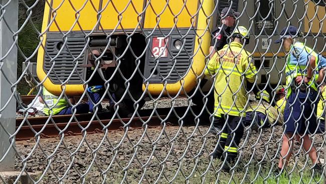 Delays are expected after a man became stuck underneath a train on the Caringbah line