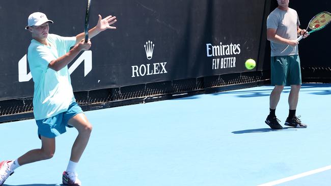 Lleyton Hewitt and Cruz Hewitt play doubles during a training session with Alex de Minaur o (Photo by Kelly Defina/Getty Images)