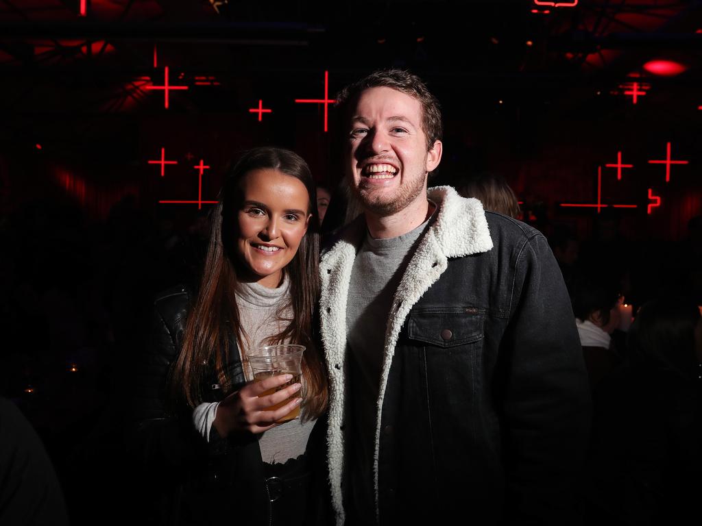 Annie Hancock, 20, of Hobart, with Dean Cook, 21, of Hobart, enjoy Dark Mofo in the city. Picture: NIKKI DAVIS-JONES