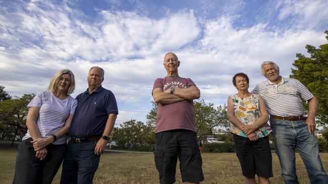 New Farm residents Sue Fuller, Paul Ewart, Fred Ropp, Bronwyn Wright and Geoffrey Warrener at a park under the new flight path. Picture: Glenn Hunt/The Australian