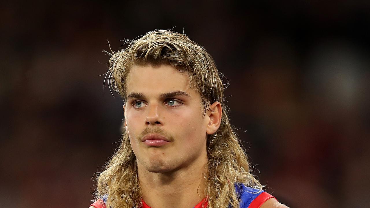 PERTH, AUSTRALIA - SEPTEMBER 25: Bailey Smith of the Bulldogs looks dejected while watching the trophy presentation after the 2021 Toyota AFL Grand Final match between the Melbourne Demons and the Western Bulldogs at Optus Stadium on September 25, 2021 in Perth, Australia. (Photo by Gary Day/AFL Photos via Getty Images)