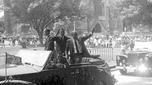 EXCITING TIME: Astronauts Neil Armstrong, Edwin (Buzz) Aldrin and Michael Collins embraced by the Sydney crowd after the 1969 moonlanding. Picture: Ed Harbas