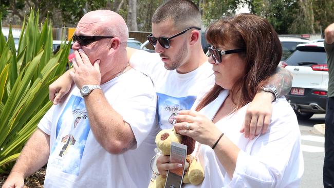 Jack Beasley’s parent’s Brett and Belinda, and older brother Mitch at the slain teen’s funeral last December