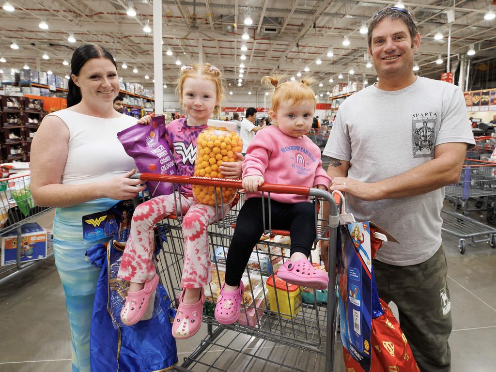 Natasha Pedlow and Andrew Hamilton from Caboolture shopping at Costco North Lakes with daughters Zailee, 3, and Shylah, 1. Picture: Lachie Millard