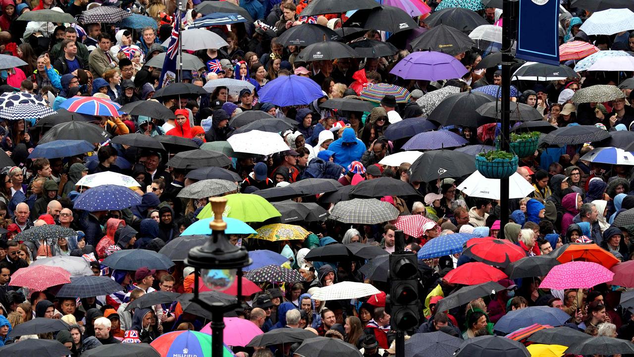 Rain was no deterrent to the crowds packed into Trafalgar Square. Picture: AFP