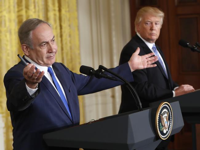 FILE - In this Wednesday, Feb. 15, 2017 file photo, President Donald Trump and Israeli Prime Minister Benjamin Netanyahu give a joint news conference in the East Room of the White House in Washington. The debate among American Jews over President Donald Trump has become as raucous as the first weeks of the Trump administration itself, hardening divisions between liberal and conservative Jews that have been growing for years. (AP Photo/Pablo Martinez Monsivais)