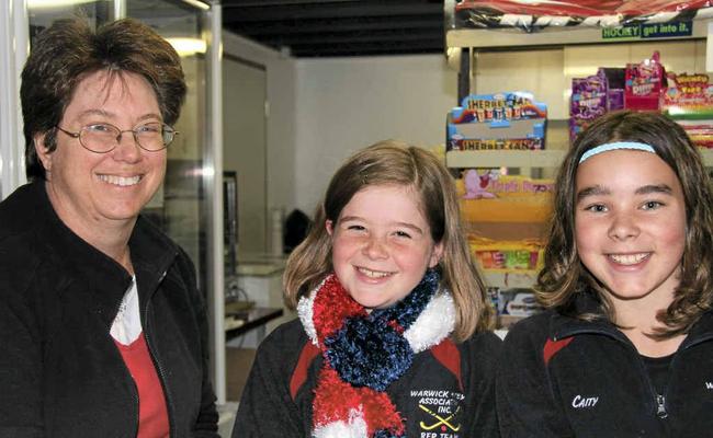 Julie See, Kaycie Gillam and Caitlin Schnitzerling have been working hard to keep the players’, supporters’ and officials’ bellies full at the Queens Park Canteen. Picture: Erin Smith