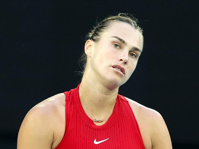 MELBOURNE, AUSTRALIA - JANUARY 17: Aryna Sabalenka reacts in their round two singles match against Linda Fruhvirtova of the Czech Republic during the 2024 Australian Open at Melbourne Park on January 17, 2024 in Melbourne, Australia. (Photo by Daniel Pockett/Getty Images)