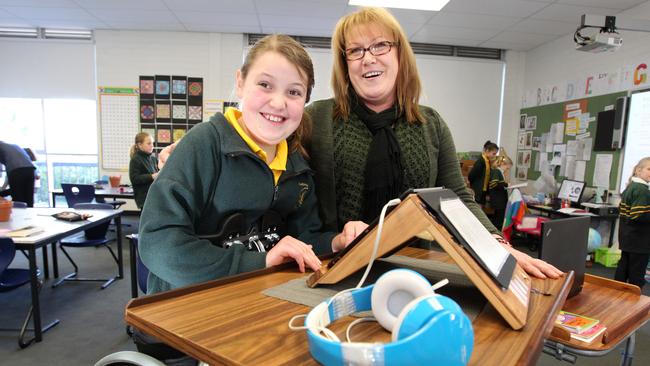 Pride of Australia nominee and Teacher assistant, Deb Langiano (right) with Blackmans Bay Primary School grade 4 student, Jade Heinstman, 10.